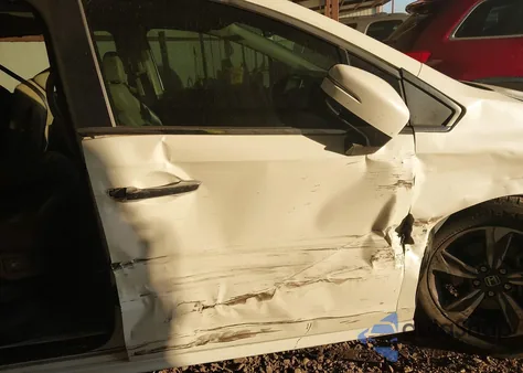 2019 Honda Odyssey Touring z USA, uszkodzony, nr VIN 5FNRL6H88KB059944